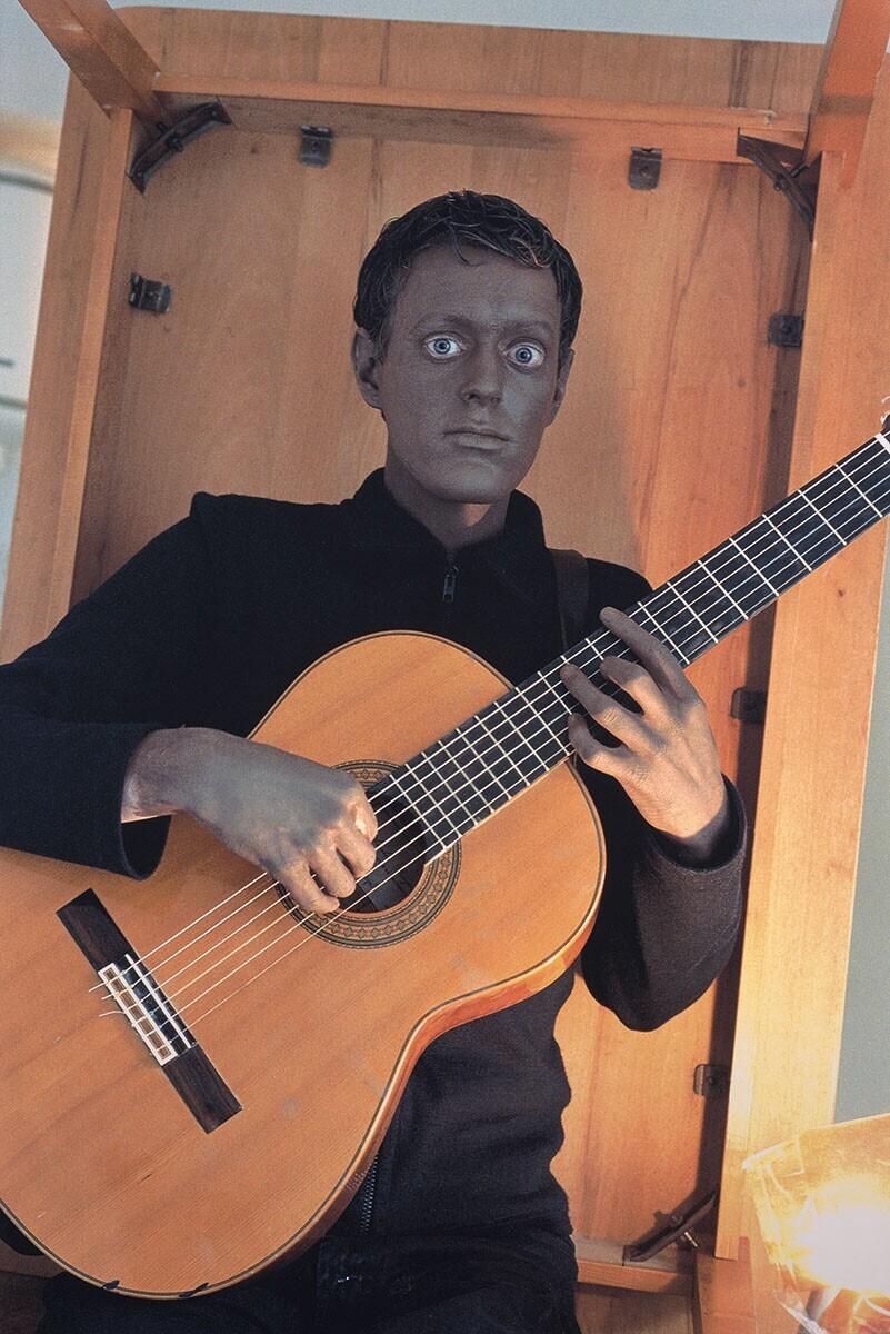 Self-Portrait with Black Face and Guitar