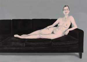 naked-woman-on-black-couch