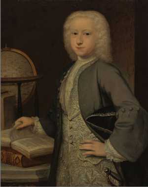 portrait-of-a-boy-standing-next-to-a-table-with-folios-and-a-globe