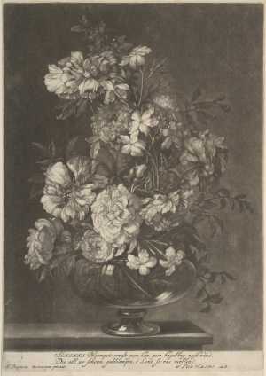 flowers-in-a-transparent-glass-vase-on-a-table