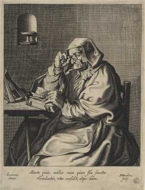 old-woman-with-spectacles-seated-at-a-table
