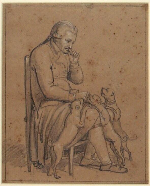 Man with three  Dogs