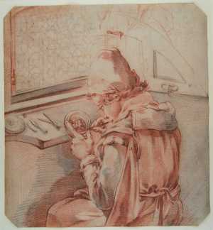 young-miniature-painter-at-work-sitting-at-a-window