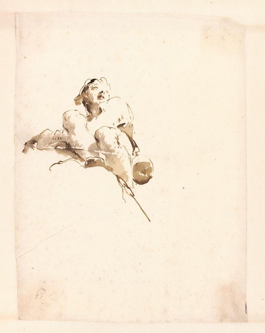 Gehurkt zittende jongen