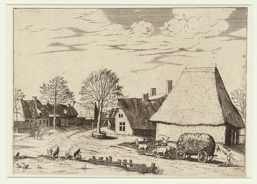 Dorpsstraat met een hooiwagen