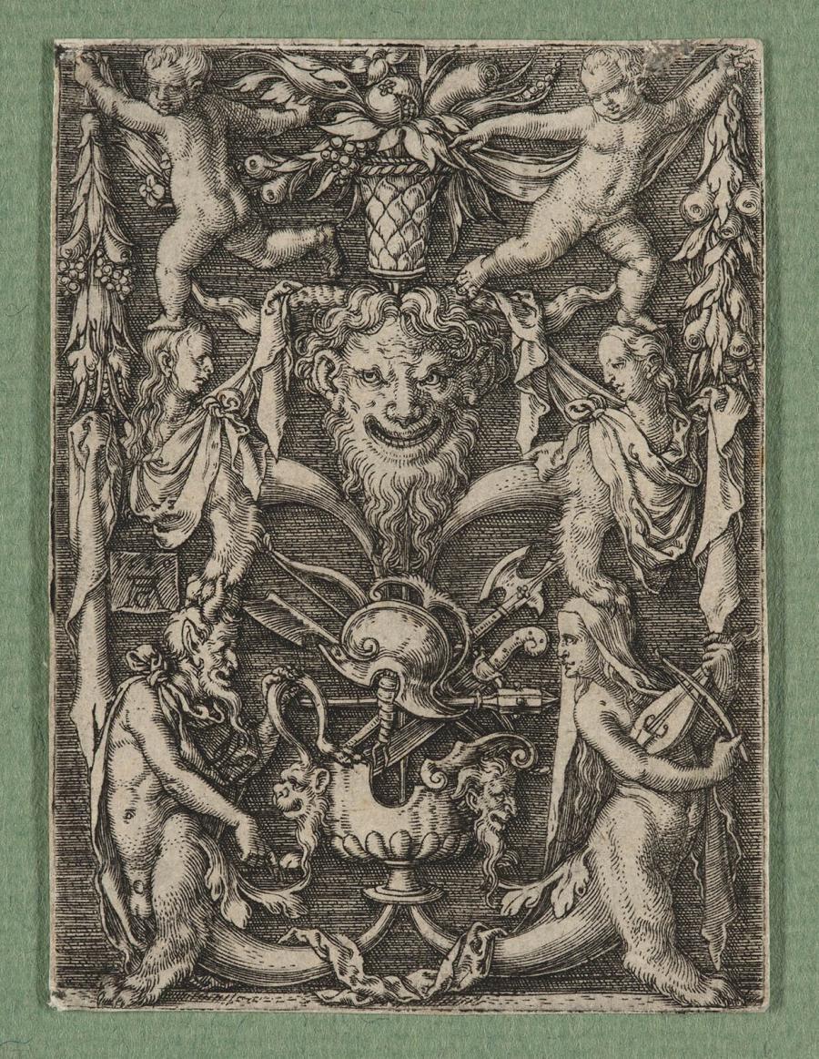 Mask with grotesque figures