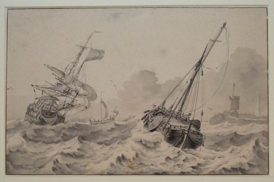 Schepen aan de kust bij stormachtig weer