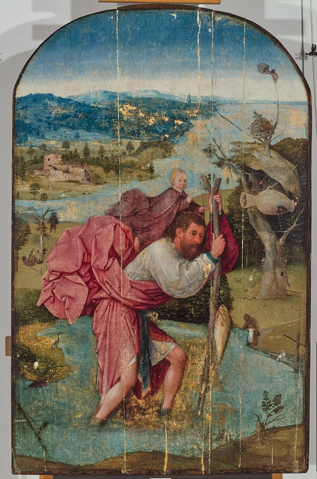 The painting before the conservation: Hieronymus Bosch, Saint Christopher, 1490-1505, oil on panel, loan: Stichting Museum Boijmans Van Beuningen 1940